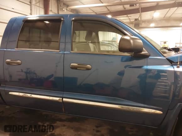 2008 Dodge Dakota Laramie with VIN 1D7HW58N08S637068, listed as a IAAI auction lot 41542177 with 171,058 mi miles and . Bid and sale history available at DreamBid. Image 14.