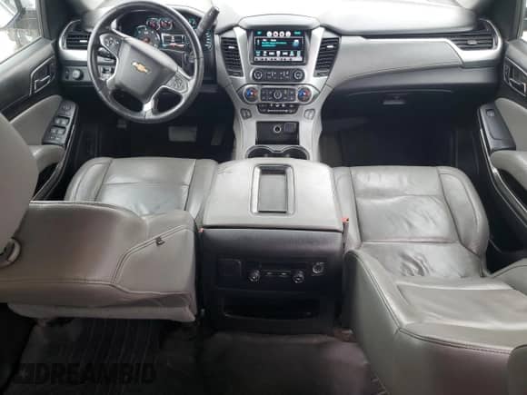 2016 Chevrolet Suburban LT z VIN 1GNSCHKC0GR162715, wystawiony jako Copart lot #51071924 z przebiegiem 247 376 mil mil oraz . Historia ofert i sprzedaży dostępna na DreamBid. Obrazek 8.