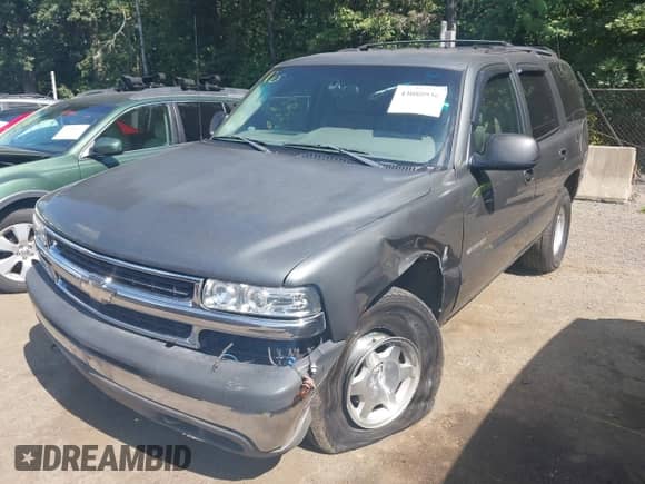 2001 Chevrolet Tahoe LS with VIN 1GNEC13T01R137713, listed as a IAAI auction lot 43080936 with 307,843 mi miles and . Bid and sale history available at DreamBid. Image 2.