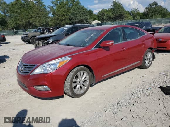 2014 Hyundai Azera Limited с VIN KMHFH4JG1EA369114, выставлен на аукционе Copart как лот 69377495 с пробегом 113 922 миль миль и Списание • Salvage title. История ставок и продаж доступна на DreamBid. Изображение 1.
