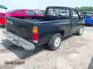 1997 Nissan Frontier XE z VIN 1N6SD11SXVC320206, wystawiony jako IAAI lot #42435128 z przebiegiem 299 944 mil mil oraz . Historia ofert i sprzedaży dostępna na DreamBid. Obrazek 4.