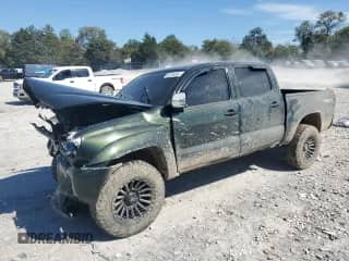 2013 Toyota Tacoma z VIN 3TMLU4EN1DM111091, wystawiony jako Copart lot #85295585 z przebiegiem 219 056 mil mil oraz Szkoda całkowita • Salvage title. Historia ofert i sprzedaży dostępna na DreamBid. Obrazek 1.