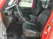 2022 Jeep Wrangler Unlimited Sahara with VIN 1C4JJXP66NW257740, listed as a Copart auction lot 66473935 with 21,823 mi miles and Salvage title. Bid and sale history available at DreamBid. Image 7.