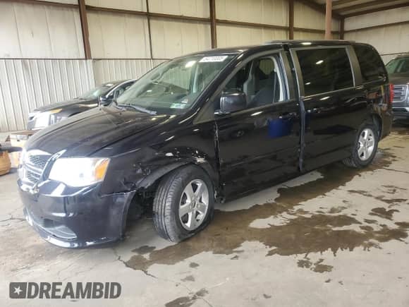 2011 Dodge Grand Caravan Mainstreet with VIN 2D4RN3DGXBR611800, listed as a Copart auction lot 84710005 with 190,362 mi miles and Salvage title. Bid and sale history available at DreamBid. Image 1.