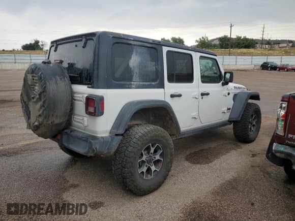 2021 Jeep Wrangler Unlimited Rubicon with VIN 1C4HJXFN8MW723304, listed as a Copart auction lot 68674255 with 69,170 mi miles and Salvage title. Bid and sale history available at DreamBid. Image 3.
