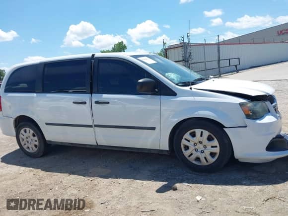 2014 Dodge Grand Caravan SE with VIN 2C4RDGBG0ER450775, listed as a IAAI auction lot 42589472 with 11 mi miles and . Bid and sale history available at DreamBid. Image 13.
