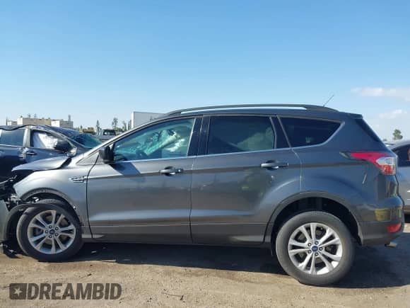2017 Ford Escape SE с VIN 1FMCU9GD3HUA51913, выставлен на аукционе IAAI как лот 43200596 с пробегом 123 226 миль миль и . История ставок и продаж доступна на DreamBid. Изображение 15.