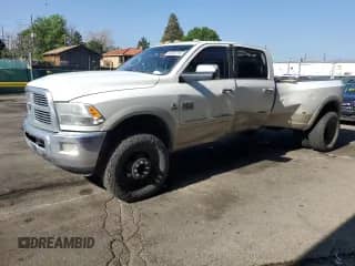 2010 Dodge 3500 Laramie with VIN 3D73Y4CLXAG162191, listed as a Copart auction lot 60295795 with 166,879 mi miles and Salvage title. Bid and sale history available at DreamBid. Image 1.