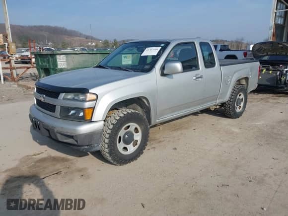 2012 Chevrolet Colorado Work Truck with VIN 1GCJTBFE2C8137604, listed as a IAAI auction lot 41767149 with 202,331 mi miles and . Bid and sale history available at DreamBid. Image 2.