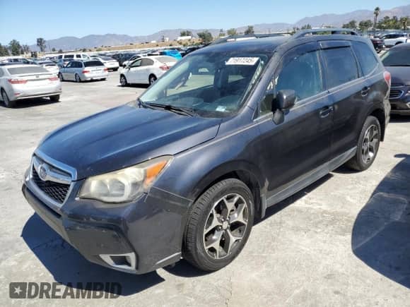 2014 Subaru Forester XT Touring z VIN JF2SJGPC5EH540243, wystawiony jako Copart lot #71917245 z przebiegiem 128 623 mil mil oraz Szkoda całkowita • Salvage title. Historia ofert i sprzedaży dostępna na DreamBid. Obrazek 1.