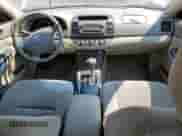 2006 Toyota Camry STD с VIN 4T1BE30K36U153837, выставлен на аукционе Copart как лот 71286925 с пробегом 76 272 миль миль и Списание • Salvage title. История ставок и продаж доступна на DreamBid. Изображение 8.