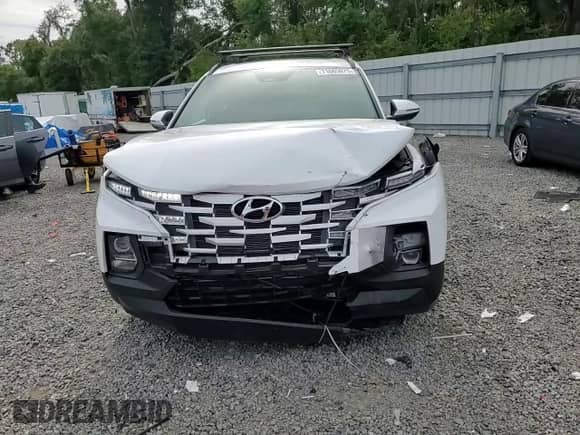 2022 Hyundai Santa Cruz SEL с VIN 5NTJC4AE3NH032434, выставлен на аукционе Copart как лот 71065075 с пробегом 10 745 миль миль и Списание • Salvage title. История ставок и продаж доступна на DreamBid. Изображение 13.