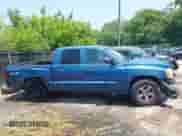 2005 Dodge Dakota SLT with VIN 1D7HW48N25S112499, listed as a IAAI auction lot 42434700 with 216,817 mi miles and . Bid and sale history available at DreamBid. Image 14.