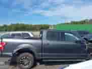 2019 Ford F-150 XLT with VIN 1FTEW1EP5KFD07969, listed as a IAAI auction lot 43245487 with 121,912 mi miles and . Bid and sale history available at DreamBid. Image 13.