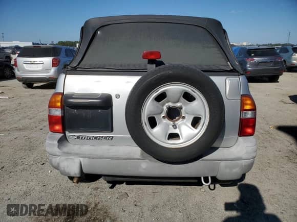 2002 Chevrolet Tracker with VIN 2CNBE18C226913895, listed as a Copart auction lot 83248644 with 122,332 mi miles and Clean title. Bid and sale history available at DreamBid. Image 6.
