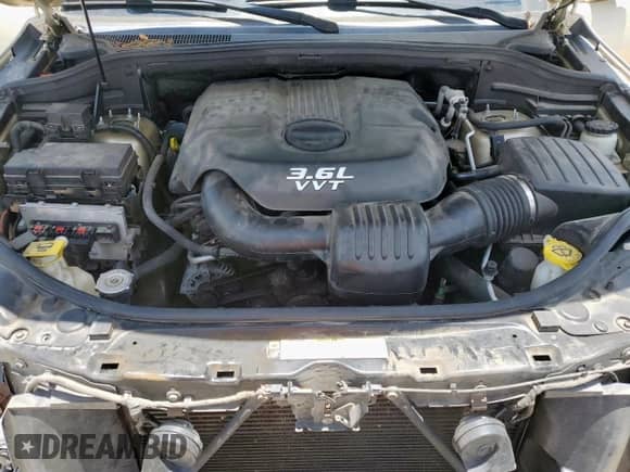 2012 Jeep Grand Cherokee Limited z VIN 1C4RJEBG8CC137430, wystawiony jako Copart lot #62833655 z przebiegiem 133 892 mil mil oraz Szkoda całkowita • Salvage title. Historia ofert i sprzedaży dostępna na DreamBid. Obrazek 11.