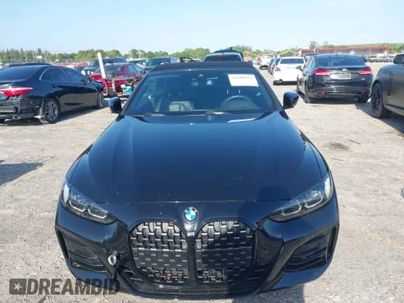 2022 BMW 4 Series 430i with VIN WBA23AT06NCJ10779, listed as a IAAI auction lot 42000961 with 49,634 mi miles and . Bid and sale history available at DreamBid. Image 12.