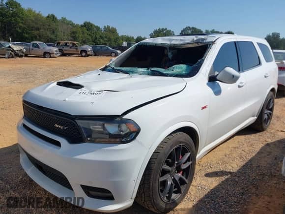 2018 Dodge Durango SRT with VIN 1C4SDJGJXJC194764, listed as a IAAI auction lot 43129897 with 141,886 mi miles and . Bid and sale history available at DreamBid. Image 2.