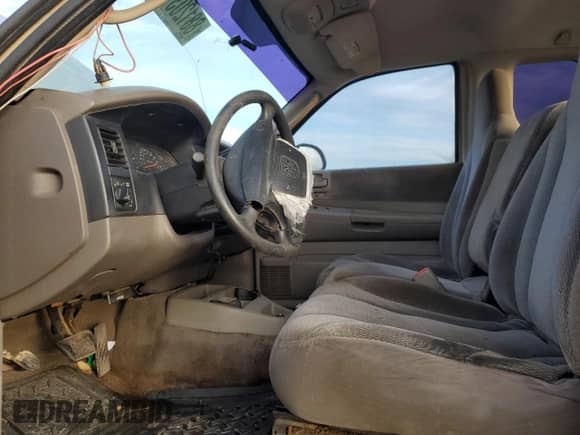 2003 Dodge Dakota SLT с VIN 1D7HG42N43S198823, выставлен на аукционе Copart как лот 88120315 с пробегом Не указан миль и Списание • Salvage title. История ставок и продаж доступна на DreamBid. Изображение 7.