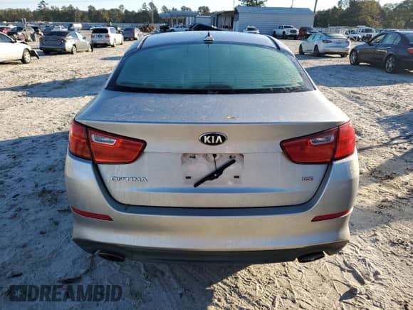 2014 Kia Optima LX с VIN KNAGM4A77E5519401, выставлен на аукционе Copart как лот 87439545 с пробегом 179 843 миль миль и Списание • Salvage title. История ставок и продаж доступна на DreamBid. Изображение 6.