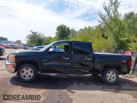 2013 Chevrolet Silverado 1500 LT with VIN 3GCPKSE76DG183528, listed as a IAAI auction lot 43109697 with 223,614 mi miles and . Bid and sale history available at DreamBid. Image 15.