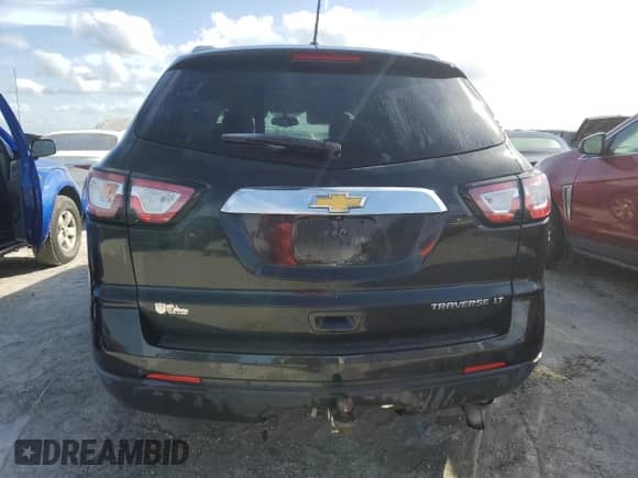 2015 Chevrolet Traverse LT с VIN 1GNKRGKDXFJ324106, выставлен на аукционе Copart как лот 76164904 с пробегом 92 884 миль миль и Списание • Salvage title. История ставок и продаж доступна на DreamBid. Изображение 6.