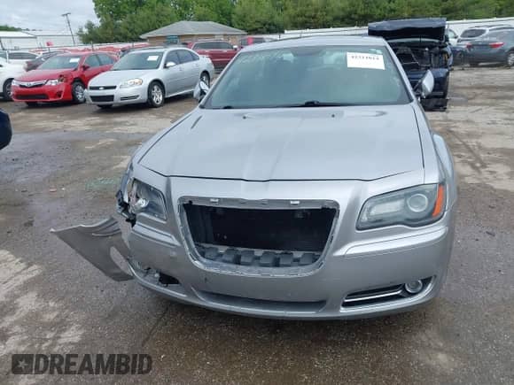 2014 Chrysler 300 S with VIN 2C3CCAGG1EH161994, listed as a IAAI auction lot 42311014 with 168,002 mi miles and . Bid and sale history available at DreamBid. Image 13.