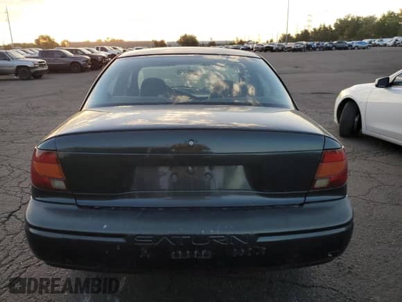 2002 Saturn SL with VIN 1G8ZG52842Z136529, listed as a Copart auction lot 69322825 with 215,279 mi miles and Salvage title. Bid and sale history available at DreamBid. Image 6.