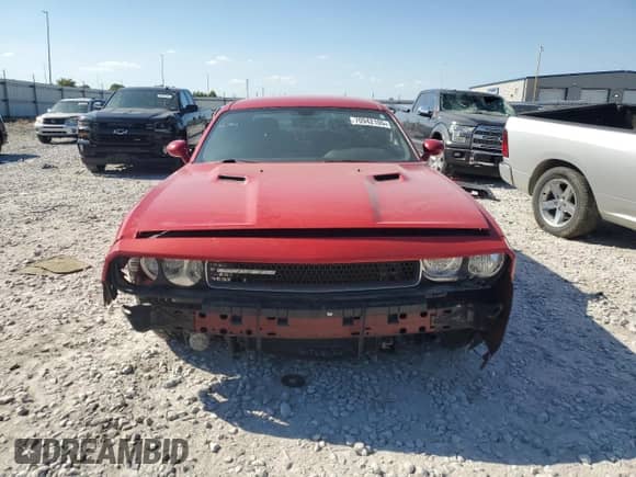 2012 Dodge Challenger SXT z VIN 2C3CDYAGXCH176831, wystawiony jako Copart lot #70942105 z przebiegiem 156 131 mil mil oraz Szkoda całkowita • Salvage title. Historia ofert i sprzedaży dostępna na DreamBid. Obrazek 5.