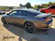 2014 Dodge Charger SXT Plus with VIN 2C3CDXHG1EH202154, listed as a Copart auction lot 82579975 with 182,563 mi miles and Salvage title. Bid and sale history available at DreamBid. Image 2.