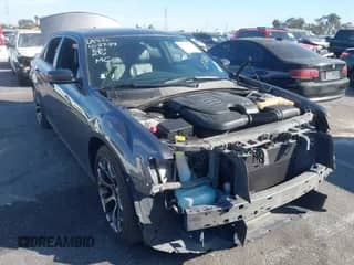 2015 Chrysler 300 S with VIN 2C3CCABG7FH766742, listed as a IAAI auction lot 40743775 with 113,583 mi miles and . Bid and sale history available at DreamBid. Image 1.