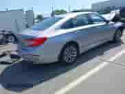 2021 Honda Accord EX-L with VIN 1HGCV3F57MA013218, listed as a IAAI auction lot 42657411 with 163,965 mi miles and . Bid and sale history available at DreamBid. Image 4.