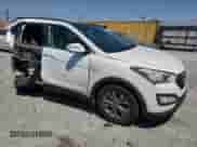 2014 Hyundai Santa Fe с VIN 5XYZU3LBXEG156137, выставлен на аукционе Copart как лот 67665465 с пробегом 156 566 миль миль и Списание • Salvage title. История ставок и продаж доступна на DreamBid. Изображение 4.