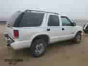 2002 Chevrolet Blazer LS z VIN 1GNDT13W02K156455, wystawiony jako Copart lot #86728515 z przebiegiem 129 995 mil mil oraz Szkoda całkowita • Salvage title. Historia ofert i sprzedaży dostępna na DreamBid. Obrazek 3.