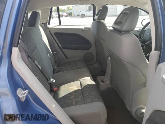 2007 Dodge Caliber SXT with VIN 1B3HB48B57D218885, listed as a Copart auction lot 83769795 with 104,586 mi miles and Salvage title. Bid and sale history available at DreamBid. Image 11.