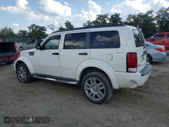 2009 Dodge Nitro SLT with VIN 1D8GU58KX9W532941, listed as a Copart auction lot 70668495 with 160,311 mi miles and Salvage title. Bid and sale history available at DreamBid. Image 2.