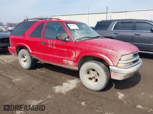 2001 Chevrolet Blazer LS with VIN 1GNCS18W21K180486, listed as a IAAI auction lot 41803349 with Not provided miles and . Bid and sale history available at DreamBid. Image 1.