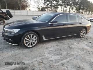 2017 BMW 7 Series 740i xDrive with VIN WBA7E4C55HGU99795, listed as a Copart auction lot 85545124 with 99,304 mi miles and Salvage title. Bid and sale history available at DreamBid. Image 1.