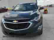 2018 Chevrolet Equinox LT с VIN 2GNAXKEX2J6169017, выставлен на аукционе Copart как лот 71102855 с пробегом 115 202 миль миль и Списание • Salvage title. История ставок и продаж доступна на DreamBid. Изображение 14.