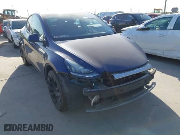 2022 Tesla Model Y Long Range z VIN 7SAYGDEE9NF443673, wystawiony jako IAAI lot #42878246 z przebiegiem 65 689 mil mil oraz . Historia ofert i sprzedaży dostępna na DreamBid. Obrazek 1.