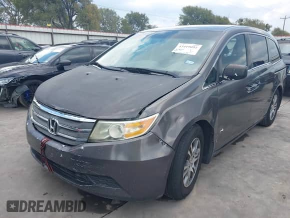 2012 Honda Odyssey EX z VIN 5FNRL5H40CB068484, wystawiony jako IAAI lot #43419092 z przebiegiem 251 003 mil mil oraz . Historia ofert i sprzedaży dostępna na DreamBid. Obrazek 19.