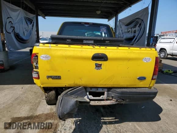 2000 Ford F-150 XL z VIN 1FTRX17W2YKB27853, wystawiony jako Copart lot #59621935 z przebiegiem 235 670 mil mil oraz Szkoda całkowita • Salvage title. Historia ofert i sprzedaży dostępna na DreamBid. Obrazek 6.