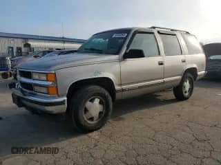 1999 Chevrolet Tahoe с VIN 1GNEK13RXXJ321362, выставлен на аукционе Copart как лот 68458865 с пробегом 237 130 миль миль и Списание • Salvage title. История ставок и продаж доступна на DreamBid. Изображение 1.