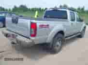 2003 Nissan Frontier XE with VIN 1N6ED29YX3C464606, listed as a IAAI auction lot 42988809 with 147,872 mi miles and . Bid and sale history available at DreamBid. Image 4.