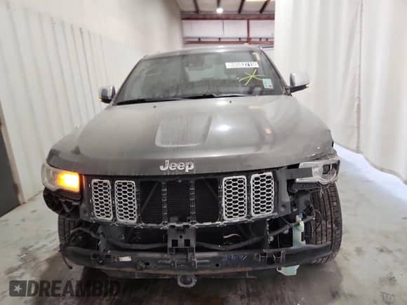 2014 Jeep Grand Cherokee Summit with VIN 1C4RJFJT8EC268672, listed as a Copart auction lot 69583715 with 157,725 mi miles and Clean title. Bid and sale history available at DreamBid. Image 5.