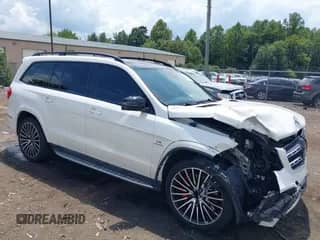 2019 Mercedes-Benz GLS 63 AMG z VIN 4JGDF7FE8KB213132, wystawiony jako IAAI lot #42985354 z przebiegiem 92 327 mil mil oraz . Historia ofert i sprzedaży dostępna na DreamBid. Obrazek 1.