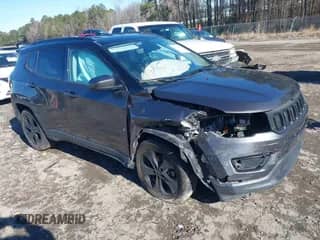 2020 Jeep Compass Latitude with VIN 3C4NJCBB8LT141103, listed as a IAAI auction lot 41263757 with 128,272 mi miles and . Bid and sale history available at DreamBid. Image 1.