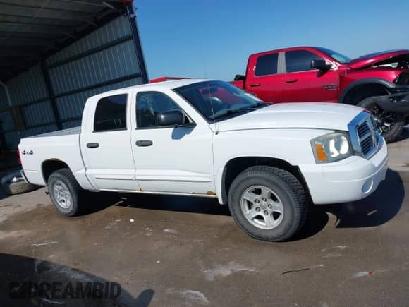 2005 Dodge Dakota SLT with VIN 1D7HW48N75S263077, listed as a IAAI auction lot 42537856 with 182,479 mi miles and . Bid and sale history available at DreamBid. Image 14.