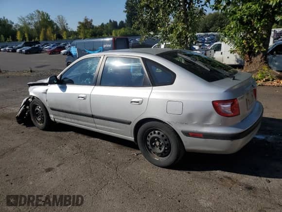 2005 Hyundai Elantra GLS with VIN KMHDN56D85U158074, listed as a Copart auction lot 83863435 with 130,587 mi miles and Salvage title. Bid and sale history available at DreamBid. Image 2.