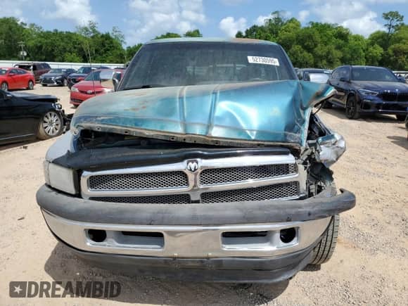 1996 Dodge RAM with VIN 3B7KC23W5TM190309, listed as a Copart auction lot 52730595 with 258,152 mi miles and Salvage title. Bid and sale history available at DreamBid. Image 5.